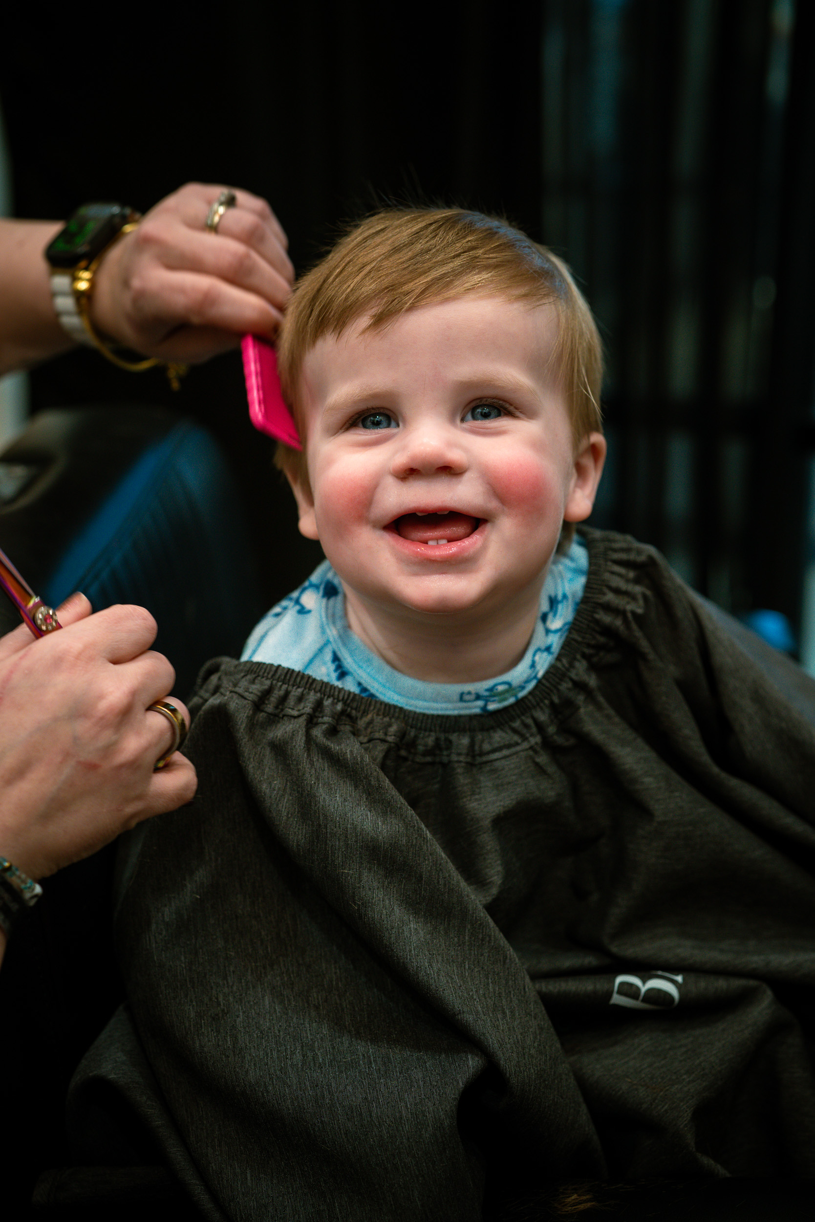Toddler mid-haircut